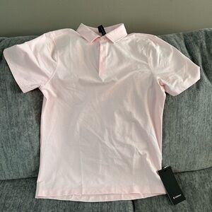 Soft Light Pink Polo Shirt with Classic Collar and Short Sleeves
